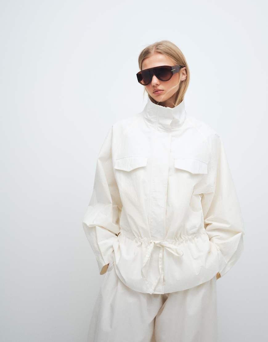 ASOS DESIGN drop waist cinched windbreaker jacket in off white-Neutral | ASOS (Global)