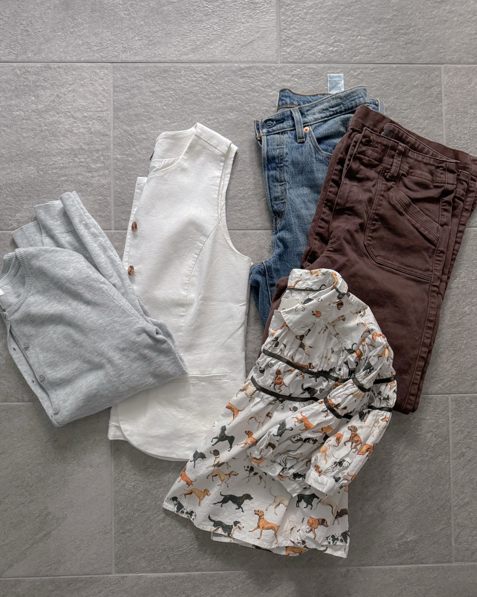 Five piece small early autumn capsule wardrobe! Mix and match for seven outfits. Wearing one today and will be sharing that soon.
1. Levi’s jeans
2. Paige brown pants
3. Light gray cardigan from Nordstrom
4. Printed short sleeve blouse from Anthropologie 
5. White structured vest from J.Crew Factory

#LTKSeasonal #LTKOver40