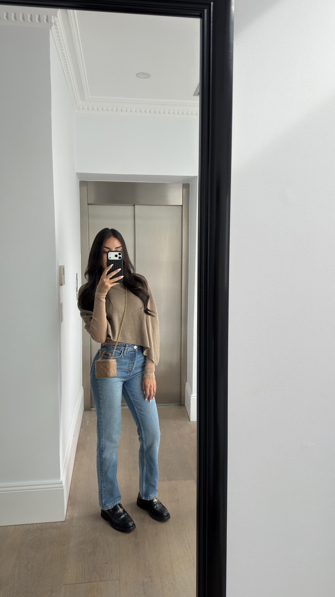 Love this cape top for the cooler months

Wearing size 25 jeans