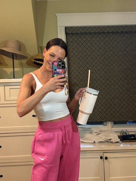 The perfect pink sweatpants with the most comfortable tank top is a great spring staple! Love the way these pants fit and feel. Wearing size 4 in shirt. Size small in sweatpants. 

#LTKstyletip #LTKSeasonal #LTKover40
