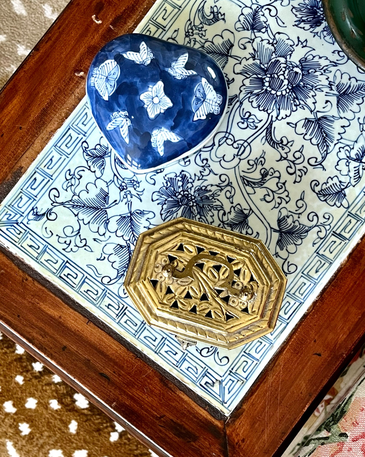 Blue and white heart shaped trinket box, brass cricket box, blue and white tile chinoiserie table = collected home

#LTKhome #LTKstyletip