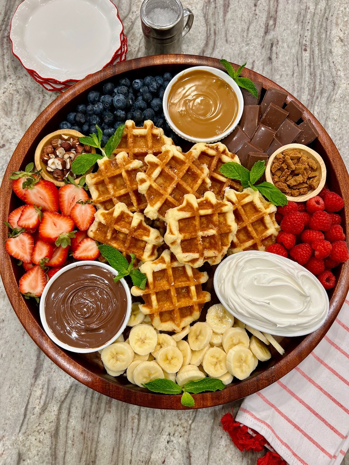 Bring the charm of a Belgian waffle café right to your table with Sweet Liège waffles surrounded by classic toppings like, Nutella, cookie butter, fresh berries, bananas, chocolate, and whipped cream. Let everyone build their own for a fun treat everyone will love!

#LTKfoodie