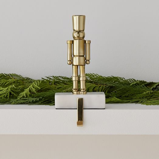 Brass & Marble Nutcracker Stocking Holder | West Elm (US)
