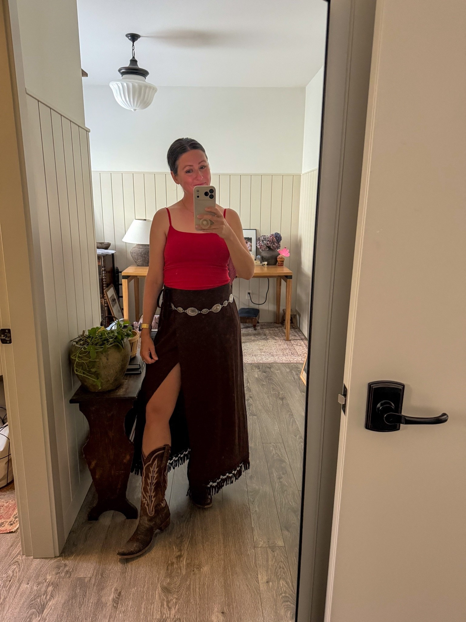 The fringe understood the assignment. 🤠🎸
We went to see Koe Wetzel, and this was my country concert outfit for the night. I wore my favorite Abercrombie bra-free cami with this fringed Zara wrap skirt and added a Target concho chain belt to give the whole look a little more western edge.

The skirt moves SO well and was basically made for a country concert. I loved this outfit because it felt cute, comfortable, and western without being over-the-top cowgirl.

If you're searching for a Koe Wetzel concert outfit, country concert outfit ideas, western concert outfit, cowgirl outfit, fringe skirt outfit, Nashville outfit, rodeo style, country music festival outfit, bra-free tank, concho belt, or summer concert fashion, I've linked my entire look here! 🤠🖤

#LTKsummer #LTKfestival #LTKdatenight