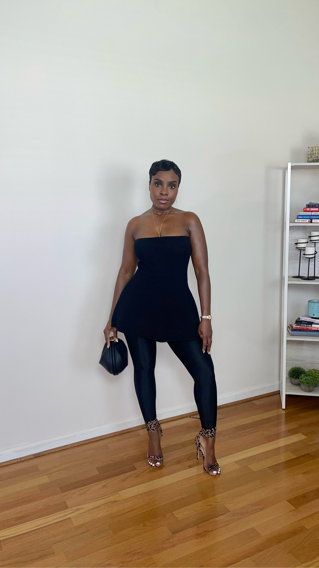 All black Date night outfit idea, strapless peplum top, black, satin shine leggings, songmont purse, leopard print heels, Anthropologie, Lululemon