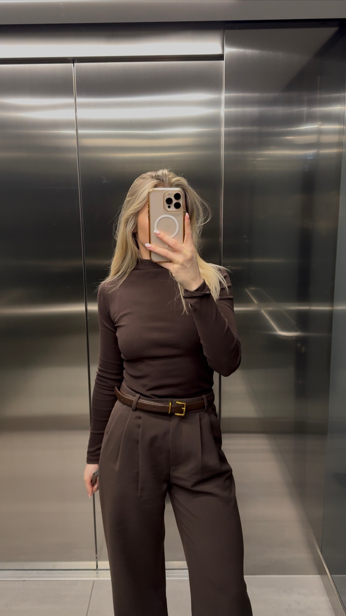 Top is Zara “High Neck T-Shirt” 0/2335/643/717/02