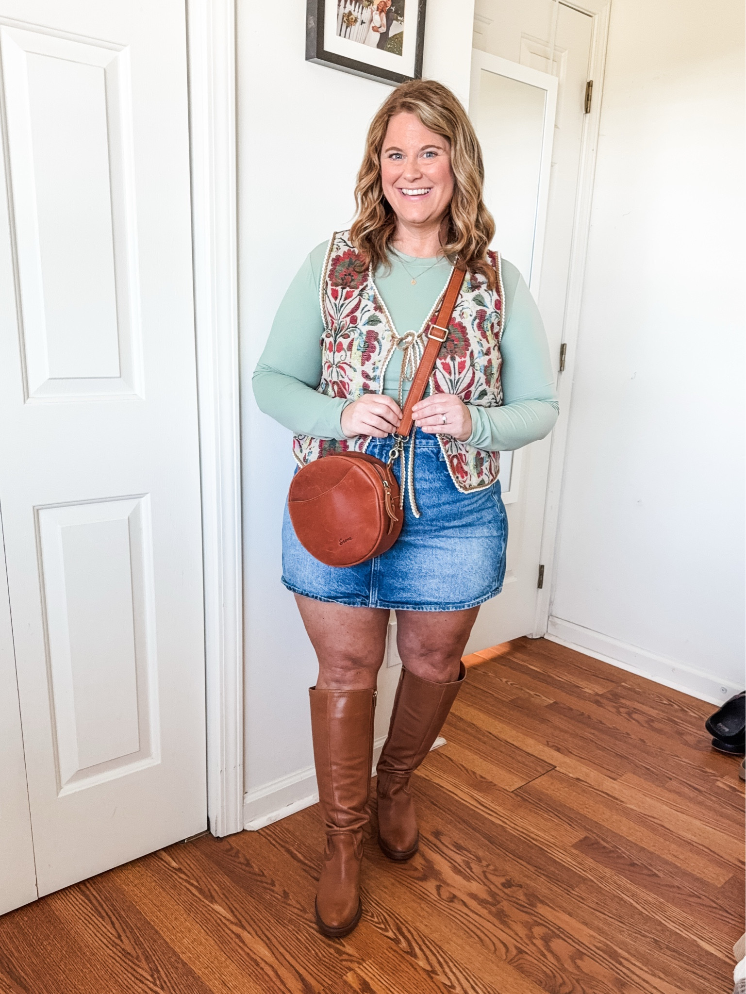 Fall outfit - patterned vest over a long sleeve top, denim skirt and tall boots

Shirt - XXL (size up)
Vest - XL
Skirt - older, linked similar
Boots - older, linked similar and current version 

#LTKMidsize #LTKFindsUnder50 #LTKSeasonal