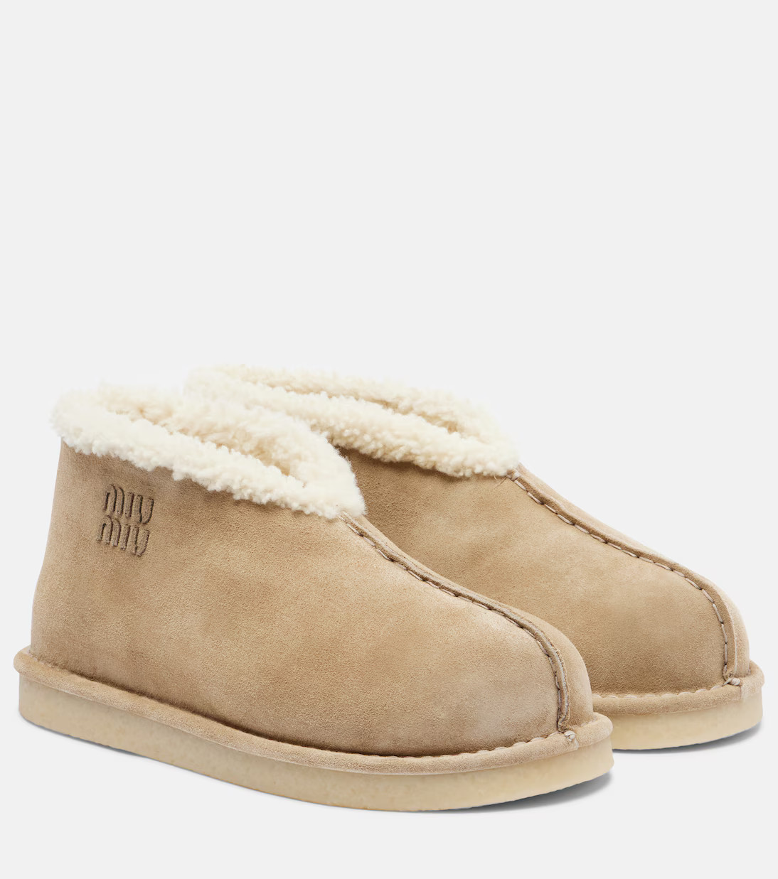 Shearling-lined suede ankle boots | Mytheresa (US/CA)