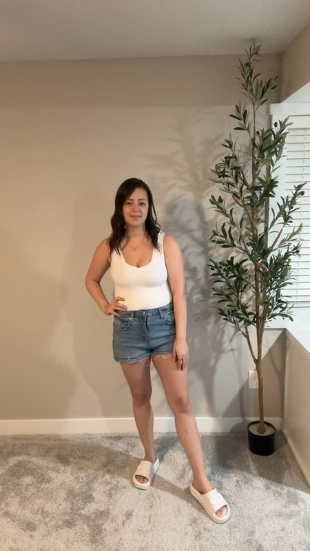 This bodysuit from Amazon is so soft and so cute paired with Jean shorts! I am wearing my true size medium in it! 

#LTKfindsunder50 #LTKstyletip #LTKVideo