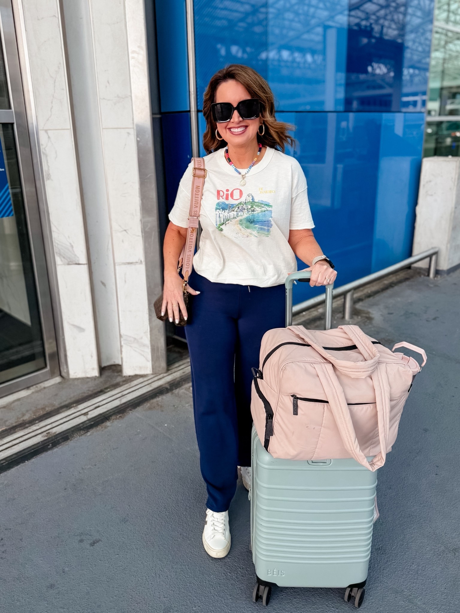 Travel outfit 
Tee runs big! Wearing XS and it’s still oversized 
Pants - use code LAURAXSPANX- true to size 
Necklace & earrings - use code LAURA 

#LTKootd #LTKOver40 #LTKTravel