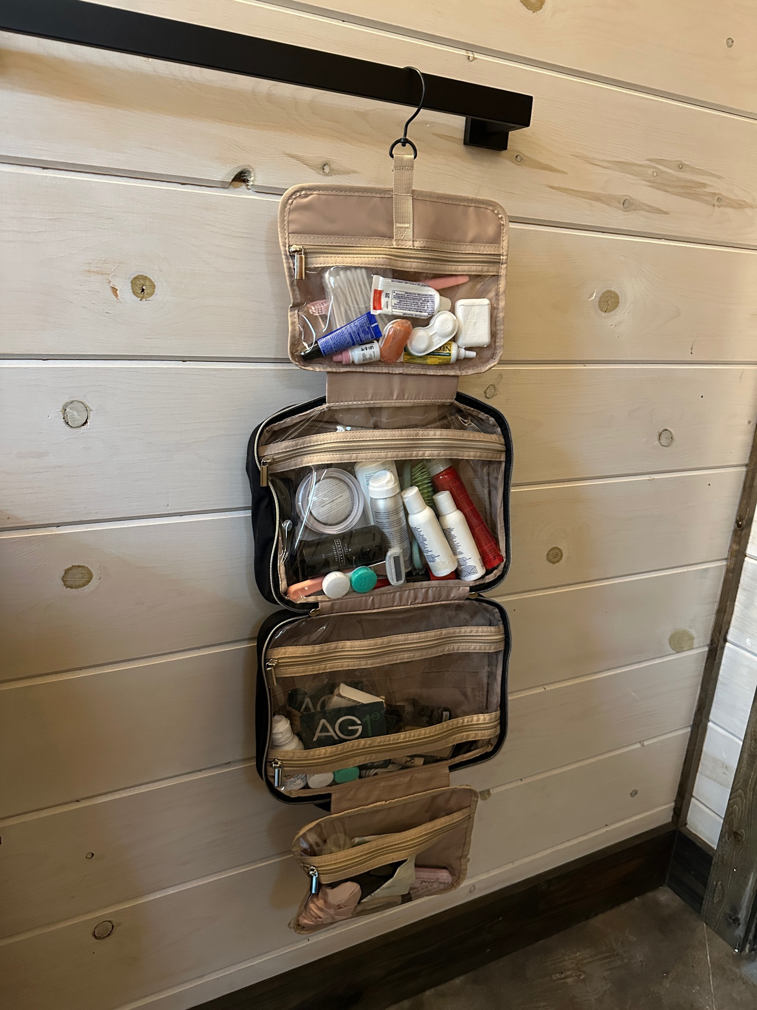 My all time favorite travel makeup  bag 

Holds soouch but my favorite part is that it hangs!!! Saves so much space 

I have the large. Comes in several
Colors 

#LTKFamily #LTKOver40 #LTKTravel