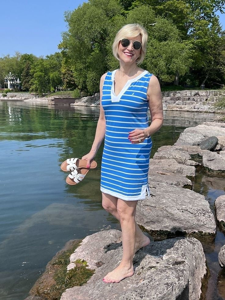 Blue and white stripes are one of those combinations I never get tired of. 💙🤍 This little dress is easy to wear, comfortable, and makes getting dressed feel so simple. Just add your favorite sandals or sneakers, and you’re ready for whatever the day has in store. Sometimes the easiest outfits really are the best. ✨

#LTKOver40 #LTKSeasonal #LTKootd