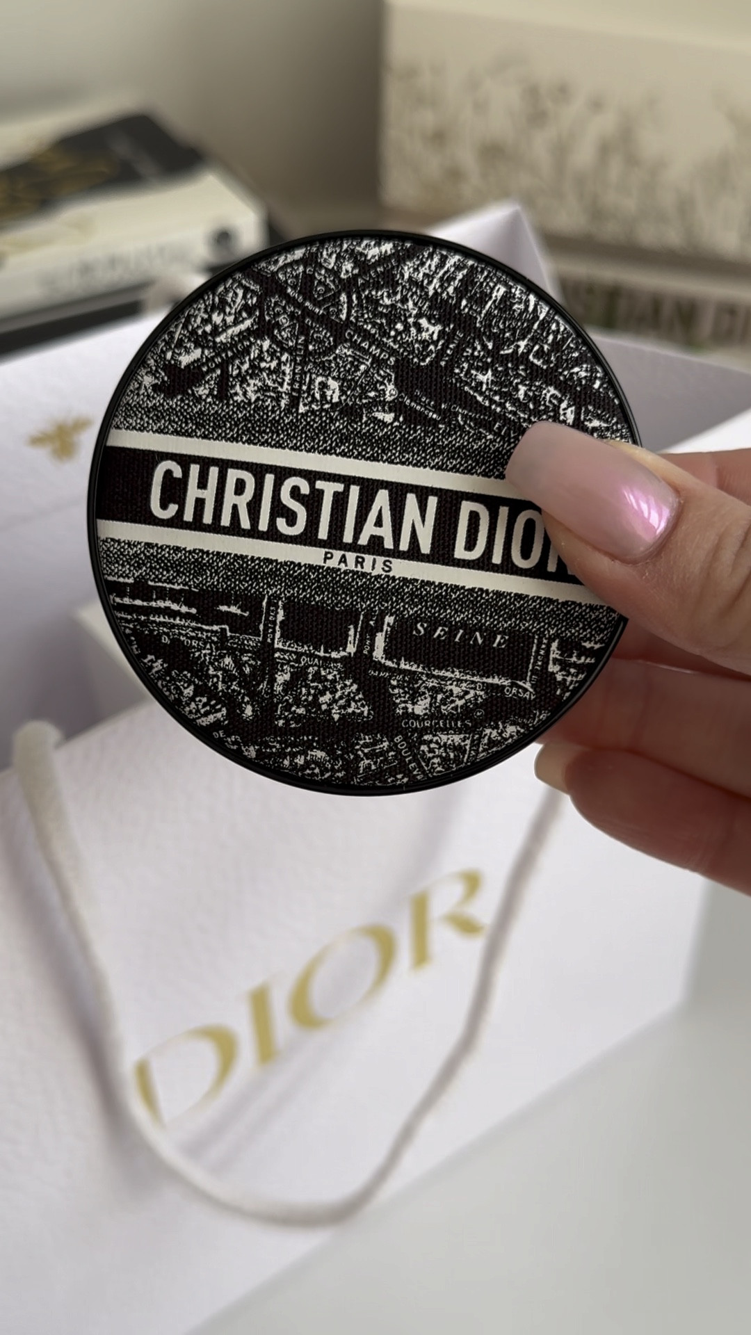 DIOR beauty haul ❤️ plus GWP ✨
Unboxing the limited edition Paris Cushion Case 🖤 How stunning is this case! 
Do you collect Dior cases? This is my first case and I don’t think it’ll be my last 🤭 

For a limited of time, you can receive your Dior Total Beauty Offer when you spend $220 or more on DIOR at DJ. Gift applied in the shopping bag.
The pouch is gorgeous and it comes with 4 mini products
- Miss Dior eau de parfum 5ml perfume 
- Dior Addict maximiser lip gloss
- Capture Totale Le Serum
- Diorshow iconic over curl mascara 

I can actually see myself using this pouch. It’s like a trousse just smaller. Perfect size for mini errands ❤️

#LTKbeauty #FashionMonth #LTKaustralia