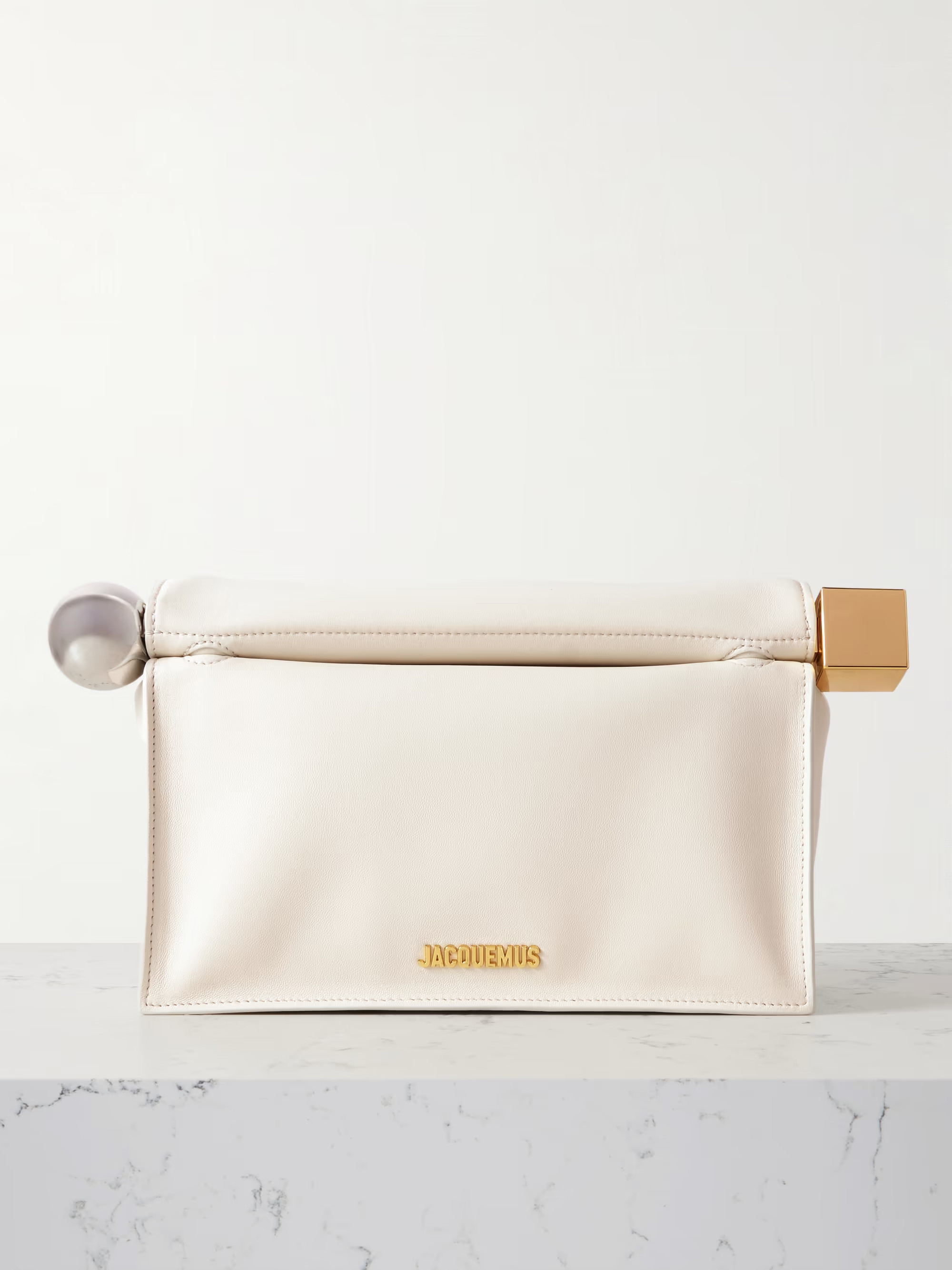 It's the artistic details that make Jacquemus' designs so special. This 'La Pochette Rond Carré'... | NET-A-PORTER (UK & EU)