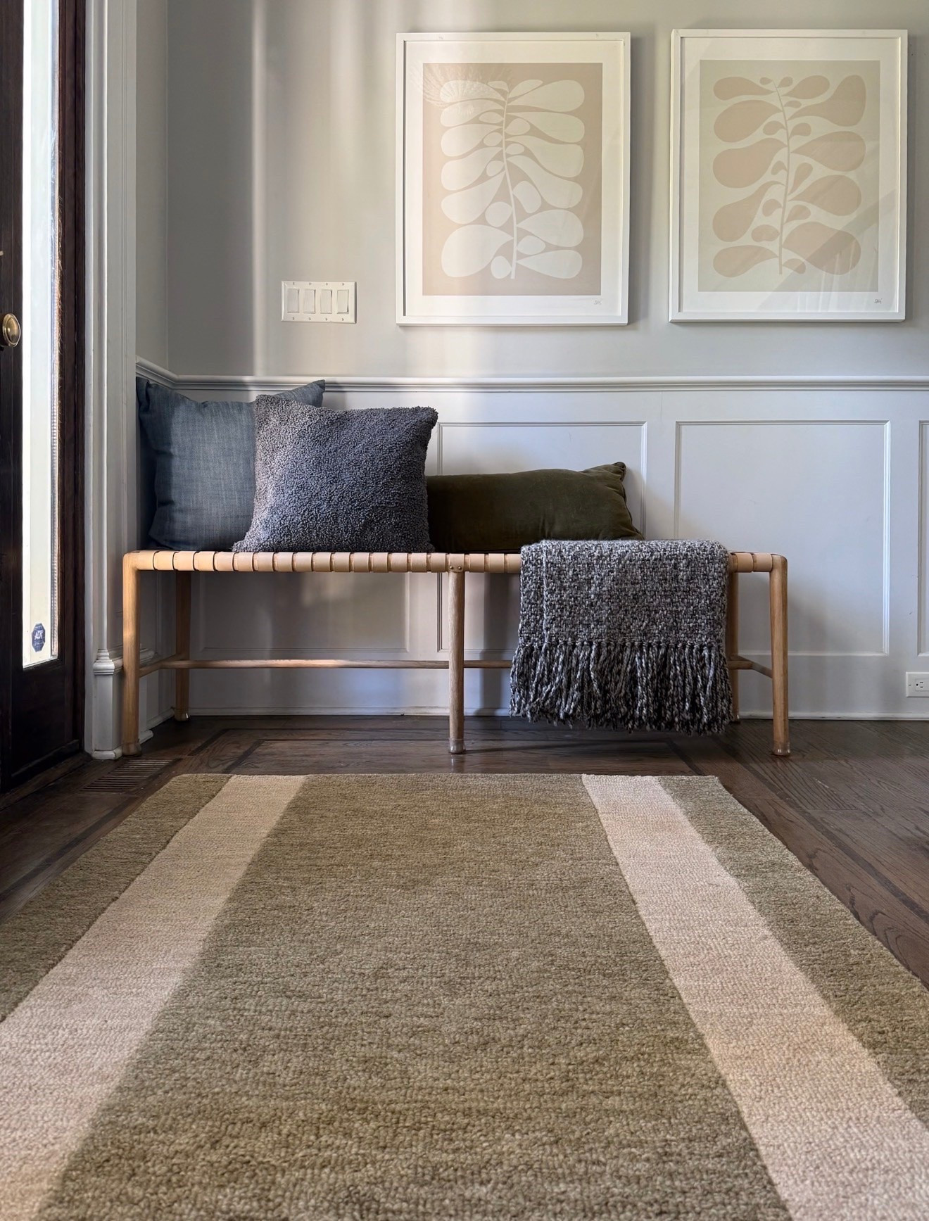 This striped rug gives the entryway just the right amount of pattern without competing with the rest of the space. The warm olive and cream palette feels especially good against the dark wood floors and brings out the natural tones in the woven bench.

striped area rug, olive green rug, neutral rug, entryway rug, modern traditional decor, warm neutral home, green home decor, entryway design, textured area rug, classic interiors, girlonthehudson

#LTKHome #LTKSeasonal