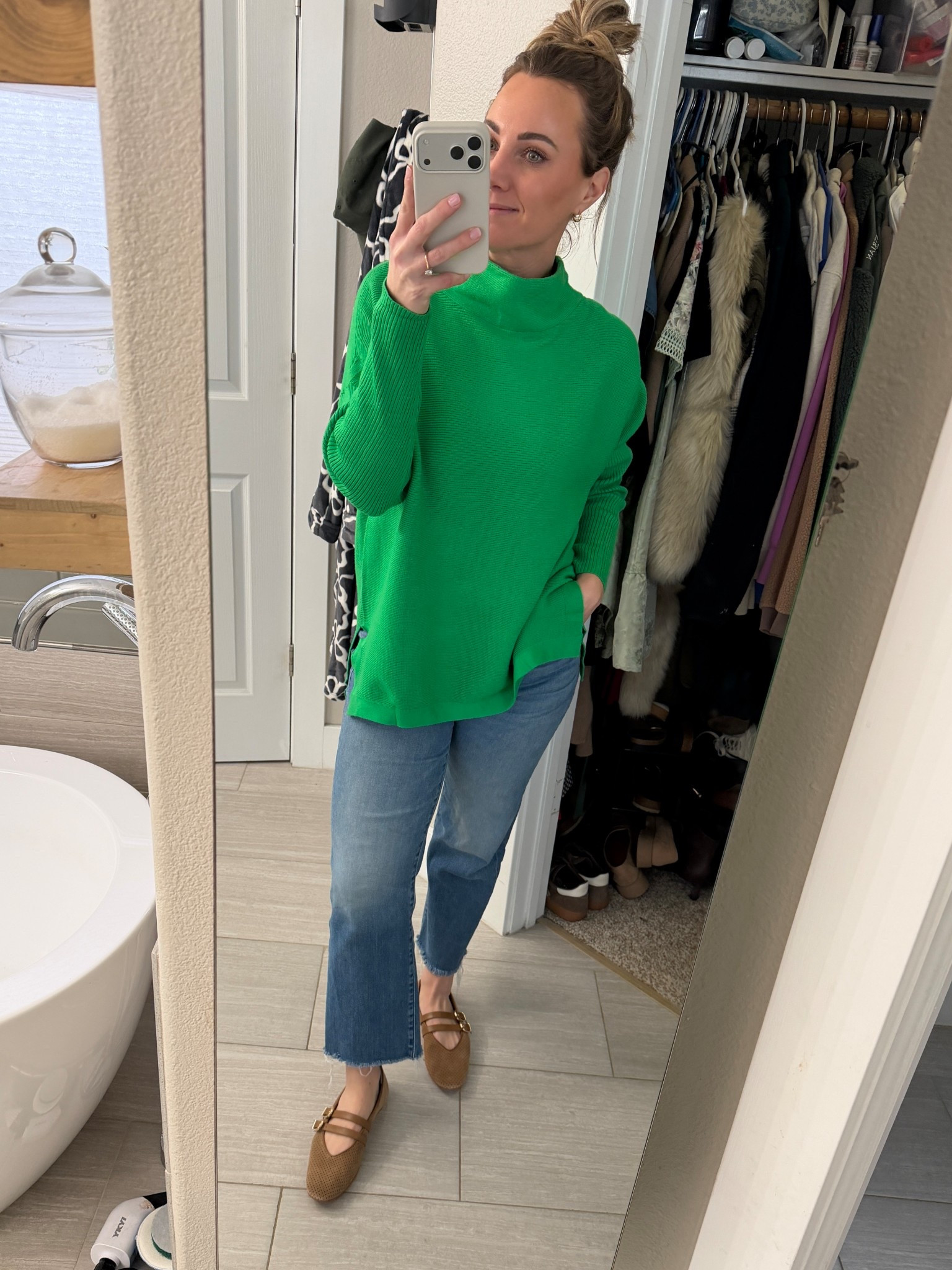 I have this sweater in 4 colors. It’ll be on rotation all winter long. Cute tucked in too  