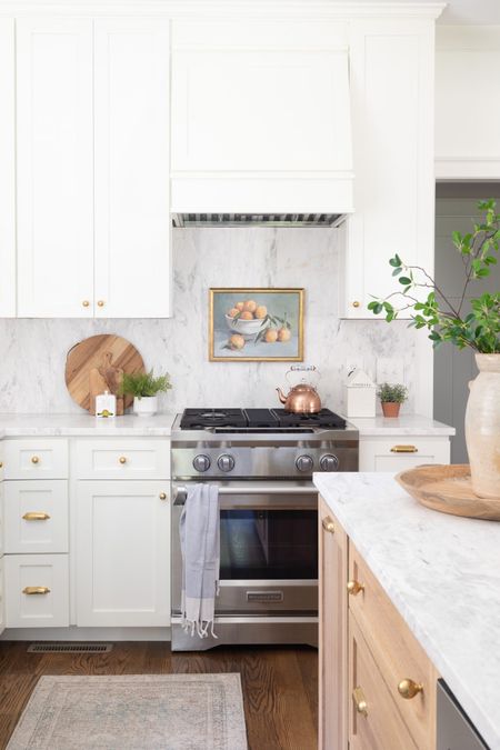 Lively white kitchen with wood island Amazon home decor, target, brass hardware with marble 

#LTKhome #LTKSeasonal