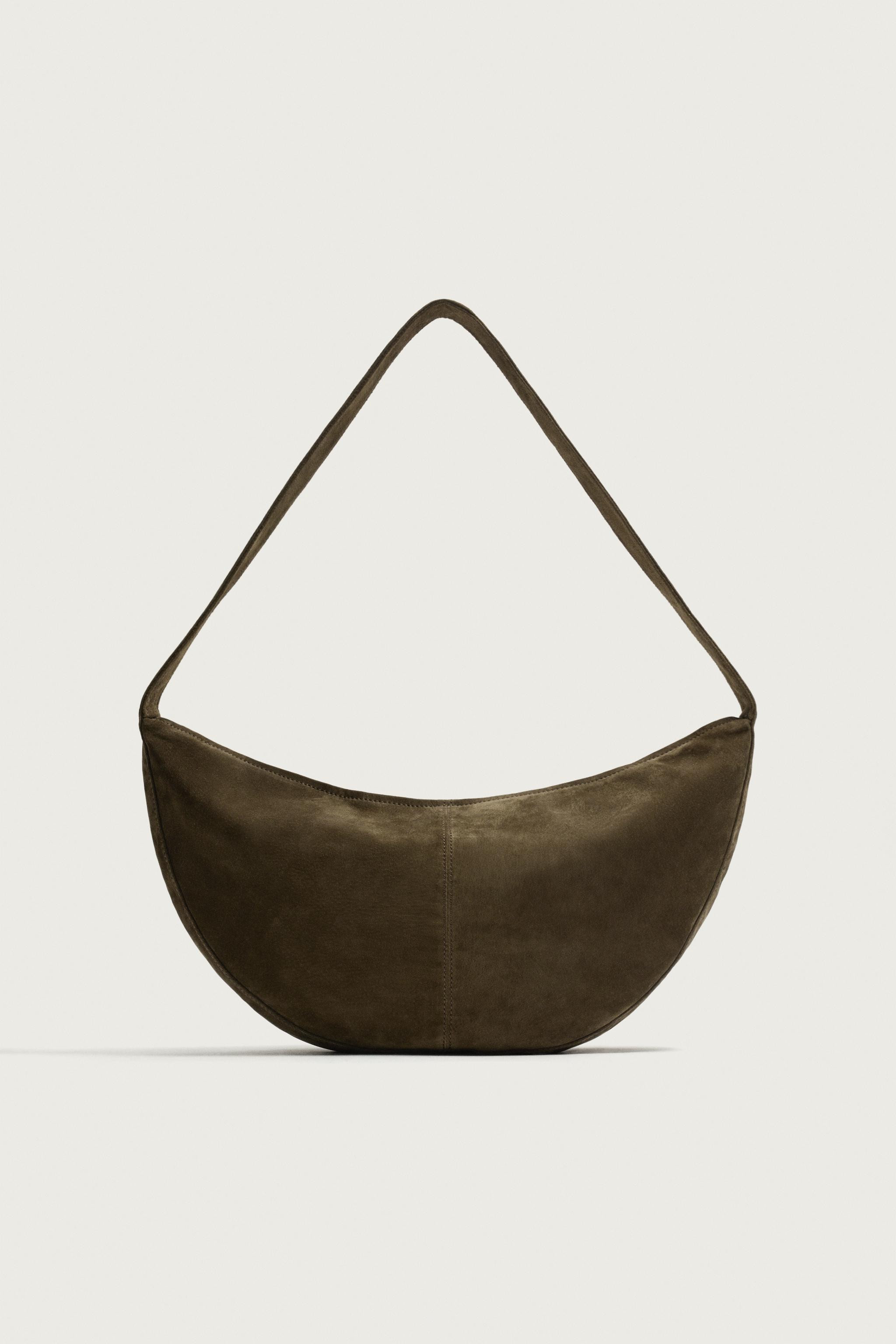Shoulder bag made of leather with a split suede finish. Main compartment with zip closure. Interi... | Zara UK