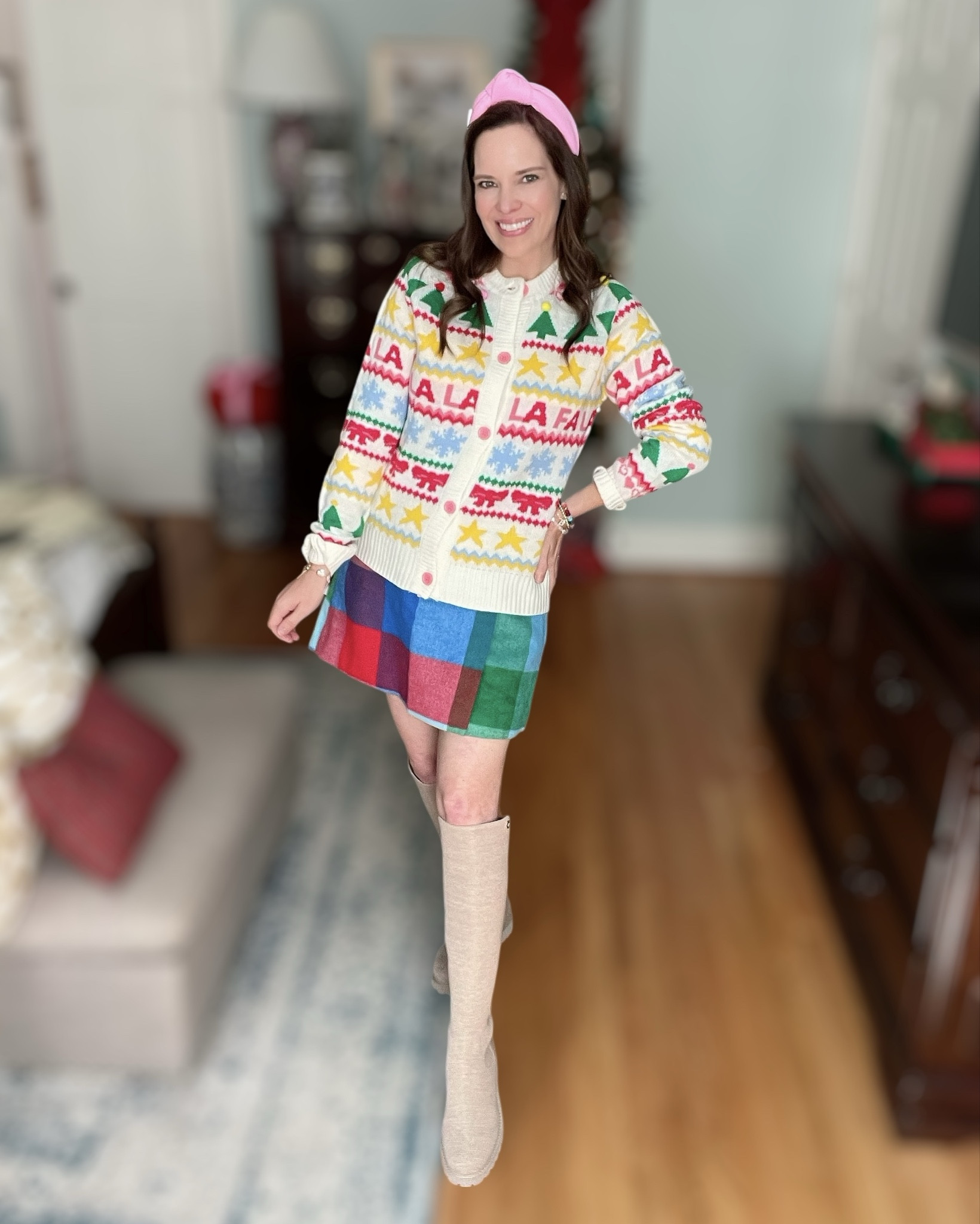 Colorful Holiday Sweater Outfit 🎄💖

The happiest holiday look! This colorful “FA LA LA” cardigan brings all the festive cheer, and I paired it with the bright patchwork mini skirt for that fun, vintage-Christmas vibe. Added my pink Lele headband for a pop of girly sparkle 💕 and the coziest knee-high knit boots to keep everything comfy. Finished it off with the cutest BaubleBar Christmas jewels for a little extra holiday magic ✨🎄

Everything shown is linked — affordable, festive, and perfect for Christmas parties, cookie swaps, school events, or just bringing joy all season long! 🎁💫

festive holiday outfit, christmas cardigan, colorful holiday style, fa la la sweater, bright winter outfit, holiday party look, walmart skirt, lele sadoughi dupe, knee high knit boots, baublebar christmas jewelry, cozy christmas style, merry & bright outfit

#LTKOver40 #LTKHoliday #LTKFindsUnder50