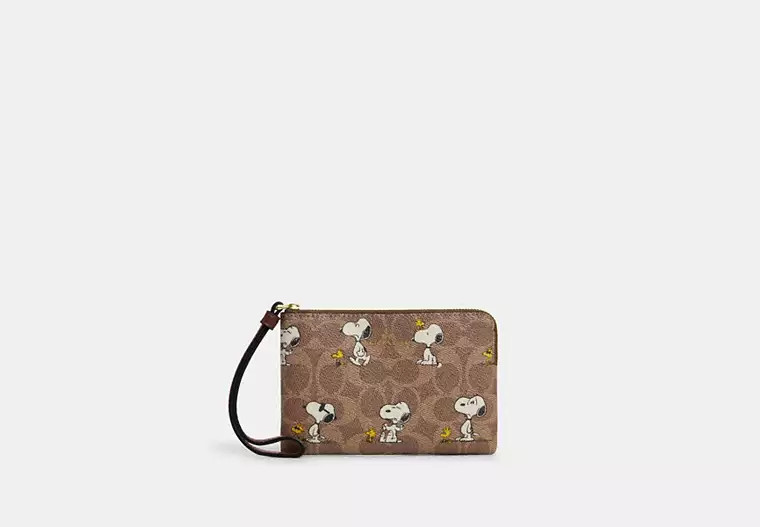 Coach X Peanuts Corner Zip Wristlet In Signature Canvas With Snoopy Print | Coach Outlet US