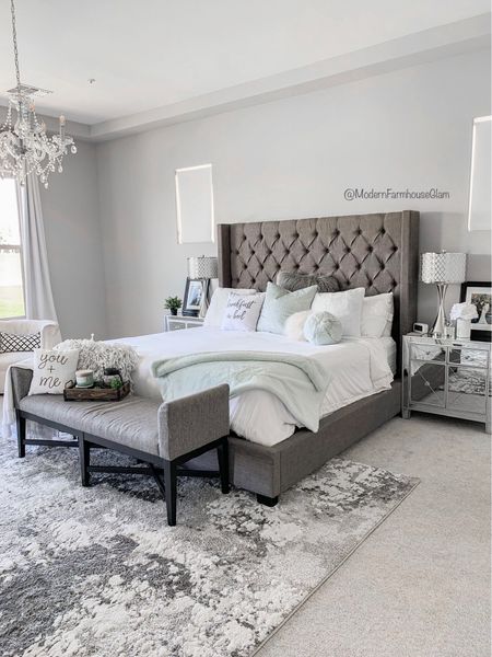 Master bedroom furniture and rug at Modern Farmhouse Glam. Mirrored nightstands, tufted headboard, tufted platform bed, bedroom bench, lighting, curtains, neutral area rug, bedroom rug, Wayfair, Pottery Barn, Amazon home

#LTKhome
