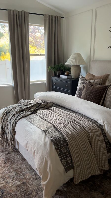 Bedroom styling ideas 

Bed on sale affordable upholstered headboard queen bed linen look curtains black chest dresser waffle quilt brown kantha Norfolk pine wreath 

#LTKHoliday #LTKsalealert #LTKstyletip