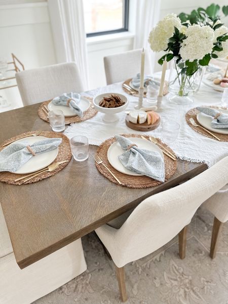 Tablescape, serveware, marble footed bowl, round placemats, blue floral block napkins, linen table throw, dining room, trestle dining table 

#LTKhome #LTKFind #LTKstyletip