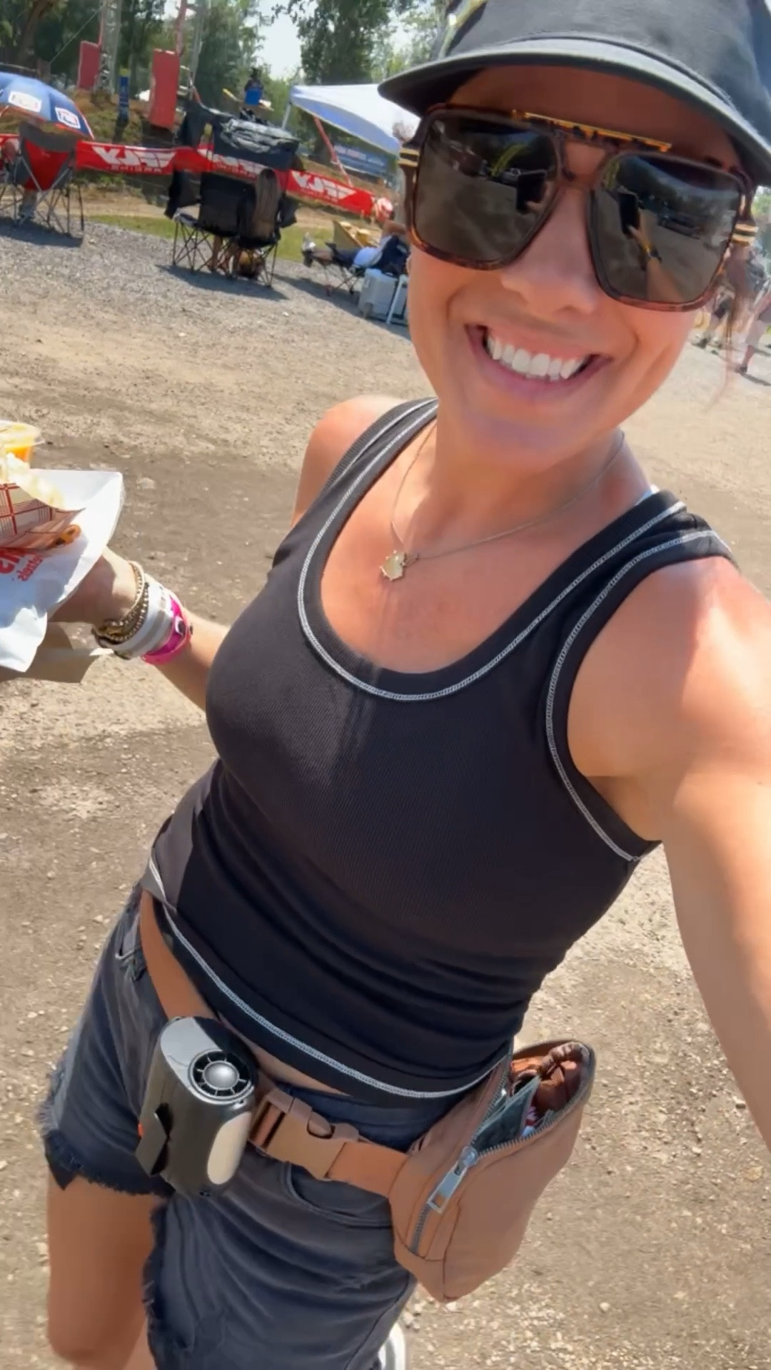 My Race day fit! Pretzels not included 😅 
I now have this basic tank in several colors! So good! And if I wanna wear denim shorts in 90 degree weather I’m always reaching for these light weight ones!  Peep the fan hooked on my belt bag to keep me cool all day! 😅 
Wearing size medium in tank and size small in shorts! 

Amazon | aerie | style | inspo | casual fit | moto mom 

#LTKOver40 #LTKStyleTip #LTKFindsUnder50