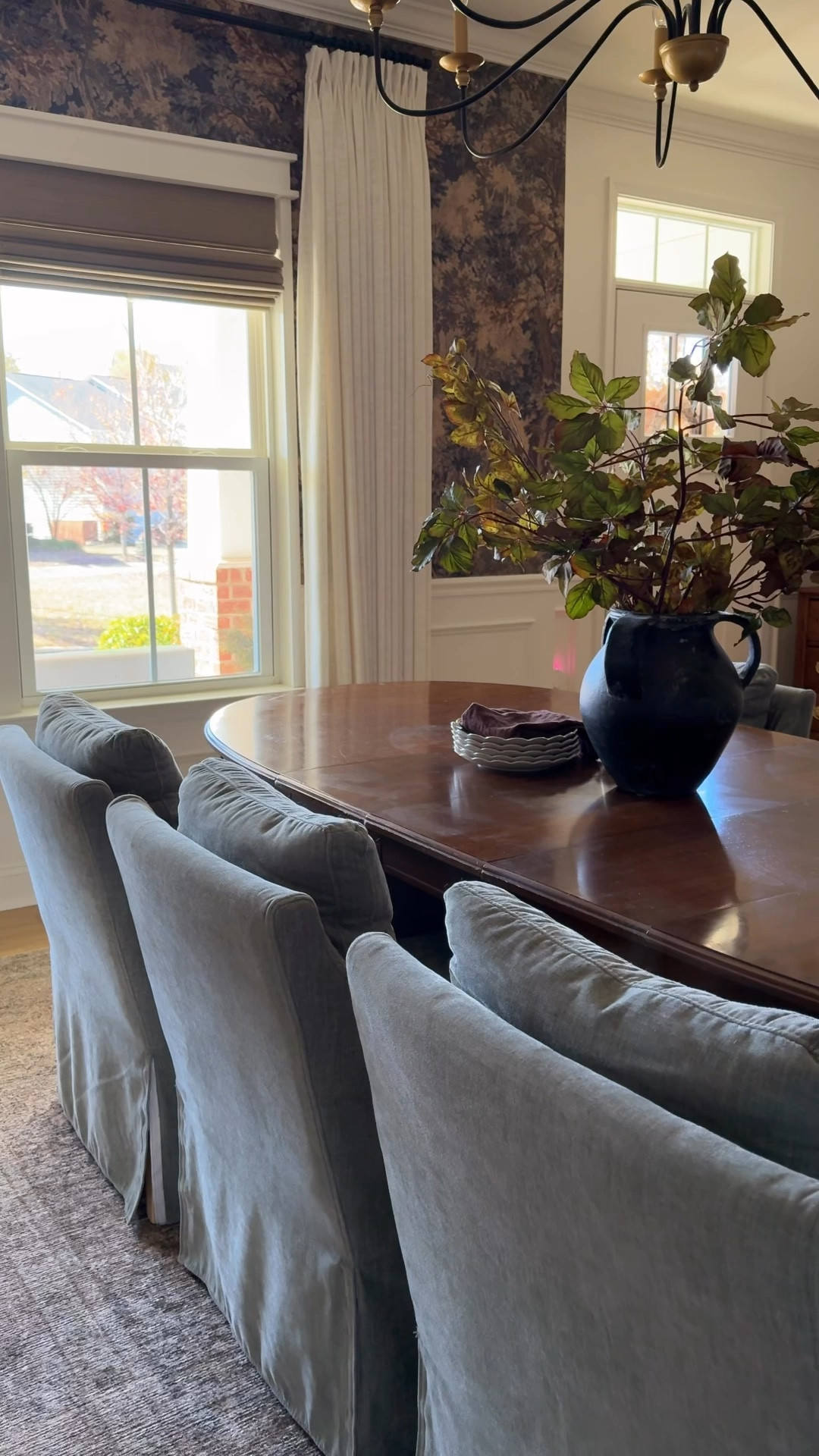 Transitional dining space, moody wallpaper and upholstered dining chairs, mix of vintage and modern 

#LTKHome #LTKHoliday #LTKSeasonal