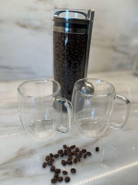 Sunday morning coffee staples. Love these double-wall coffee mugs and cylinder container. Coffee mugs keep hot beverages, hot and cold beverages cold. Cool to the touch, microwave, safe and dishwasher safe. This cylinder glass container is vacuum sealed and fabulous for storing coffee beans and so much more  

#LTKhome #LTKfindsunder50 #LTKfindsunder100