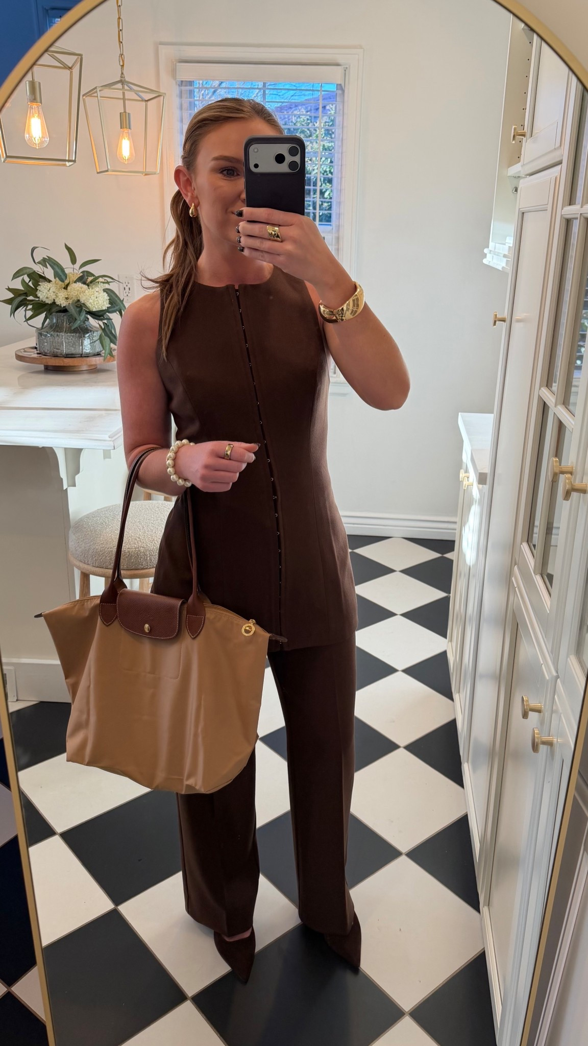 Wearing a Reformation matching set (bought as a set) with Stuart Weitzman chocolate heels and my Longchamp tote. Kept it simple with Amazon jewelry — easy outfit that looks put together without overthinking it.


#LTKStyle #LTKFinds #OOTD #MatchingSet #Reformation #NeutralOutfit #ChocolateBrown #WorkOutfit #BusinessCasual #ClassicStyle #CapsuleWardrobe #AmazonJewelry #LongChamp #BrownOutfit #OfficeStyle #WorkOutfit #Professional #WomensWorkOutfit #Amazon #KittenHeels 

#LTKWorkwear #LTKPetite #LTKootd