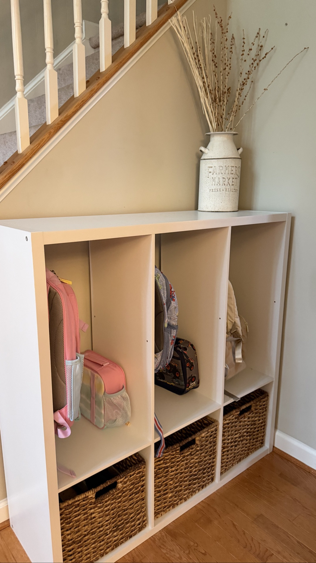 One year later and this DIY drop zone is STILL one of my favorite home organization projects! 🙌

We turned a simple cube organizer into a drop zone for all three kids by leaving out two of the shelves, adding heavy-duty Command hooks for backpacks, and using baskets underneath for shoes + socks.

After a full year of backpacks being hung up, kids grabbing things on and off, and everyday use, it’s still holding up SO well!

Everything we used to create our DIY drop zone is linked here! 🤍

#LTKHome #LTKKids #LTKmorningroutine