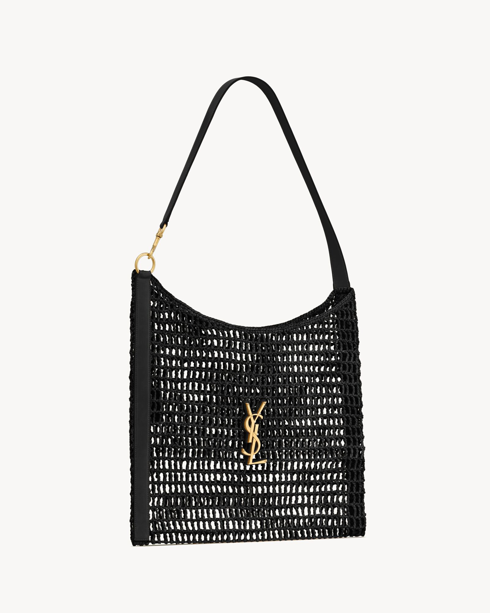 Net shoulder bag in macramé with a dual-length leather shoulder strap, decorated with the CASSAN... | Saint Laurent Inc. (Global)