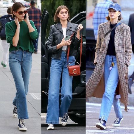 CONVERSE
Steal some style inspiration from Cindy Crawford’s daughter model and actress Kaia Gerber. Gerber rocks classic high-top converse sneakers with wide-leg jeans and classic layers like a pullover sweater, leather jacket, and plaid coat.