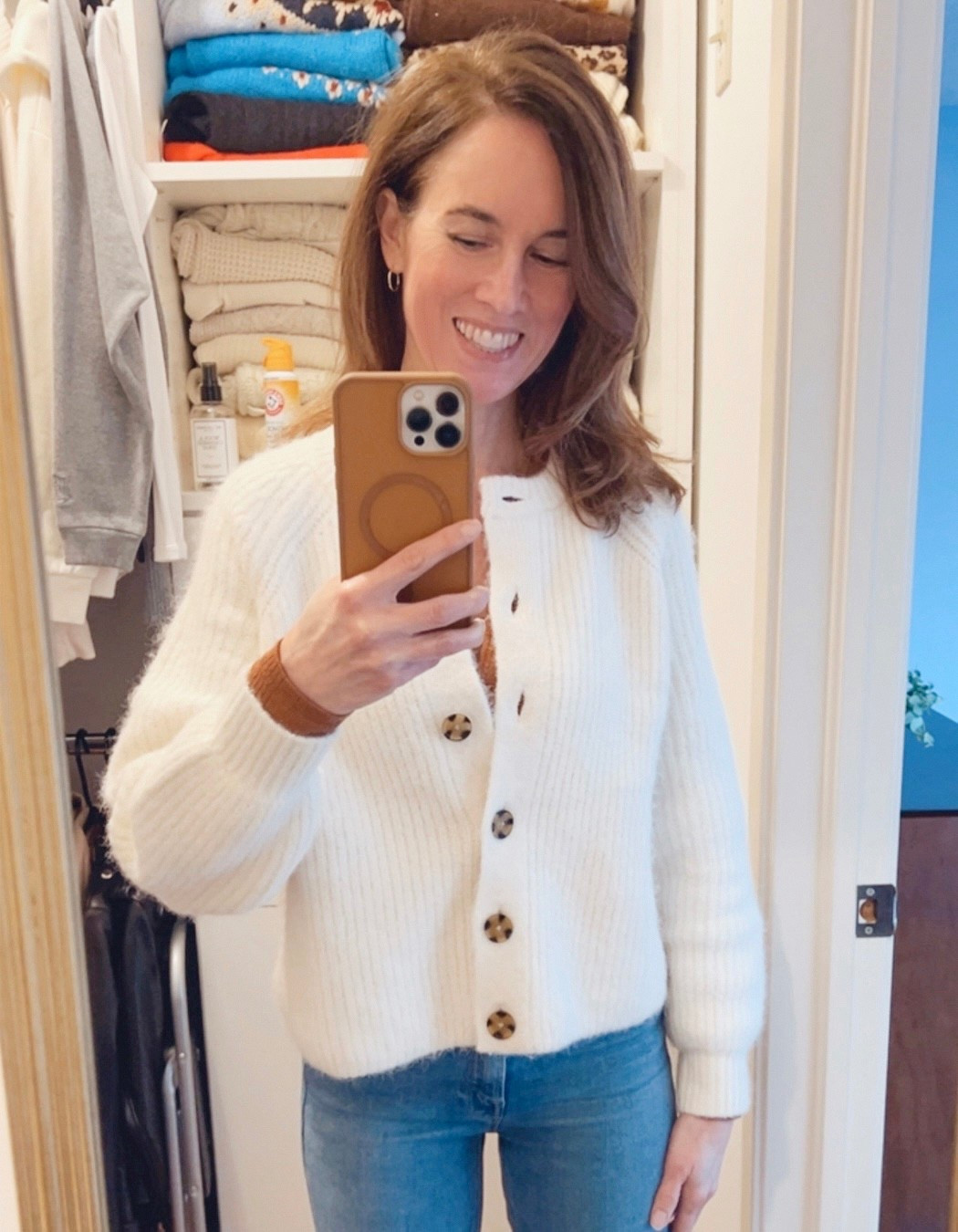 Sweater of the day: Gap Off white Ribbed cardigan with wooden buttons layered over American Eagle Henley and Gold hoop earrings and Gold chain necklace #Sweaters #wintersweaters #OOTD #winteroutfit #over40style

#LTKdayinmylife #LTKSaleAlert #LTKFindsUnder50