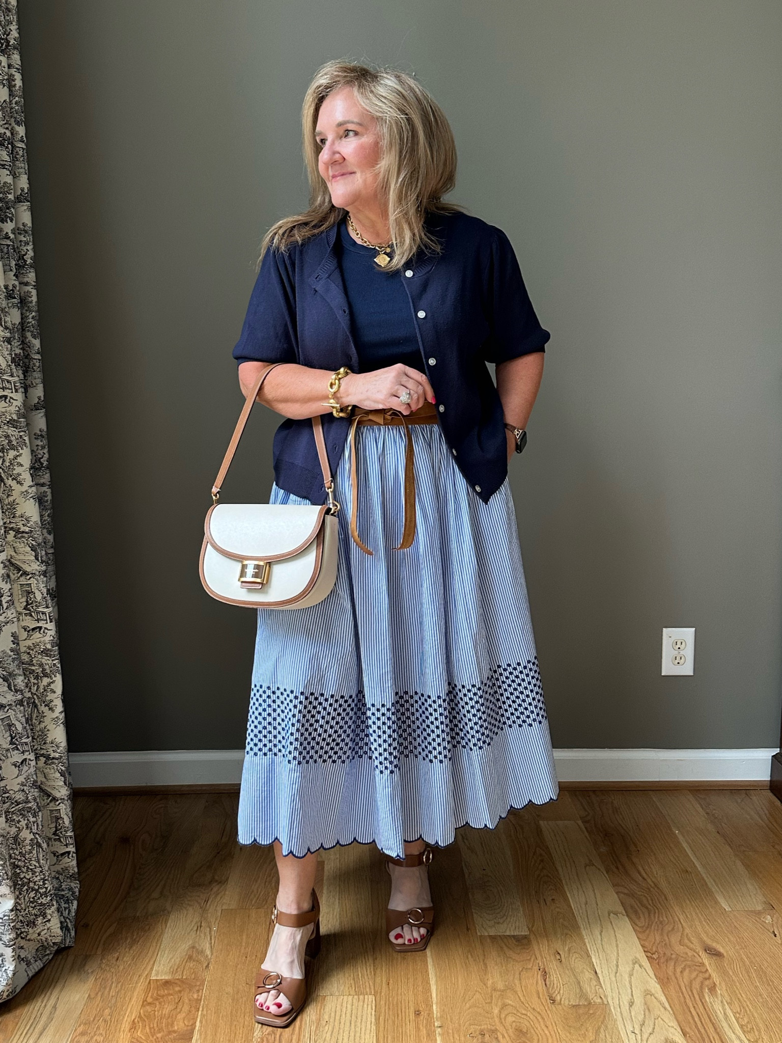 Hold the phone. My purse is on sale over 50% off!!!! Comes with the crossbody strap and the shoulder strap. Beautiful quality. 

Skirt size large. 
Cardigan size XL (I think the large would work)
Tank size XL
Shoes tts 

#LTKSaleAlert #LTKItBag #LTKOver40