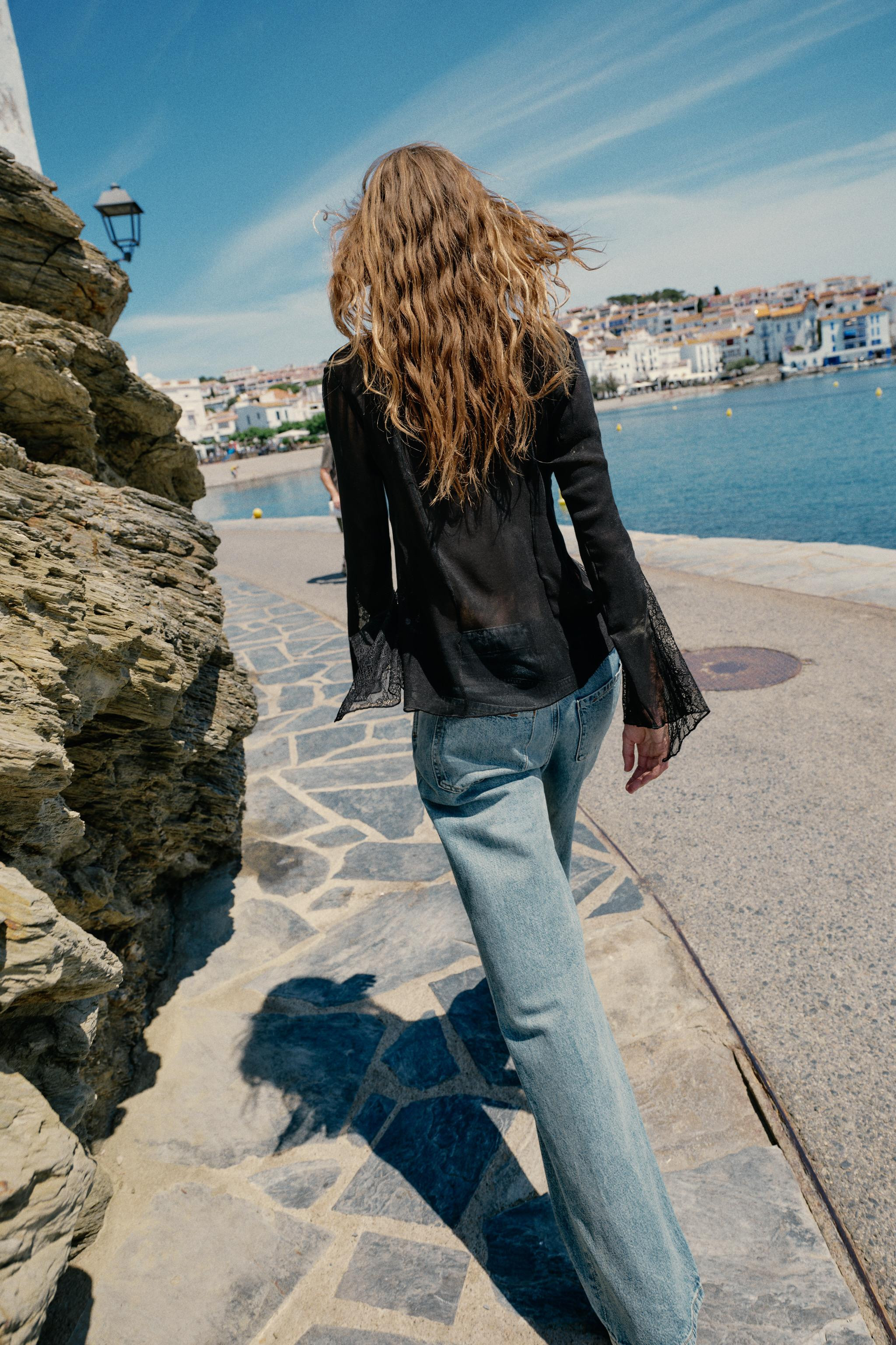 DescriptionContentsMeasurementsTop made of a viscose blend yarn. V-neckline and long sleeves with... | Zara US