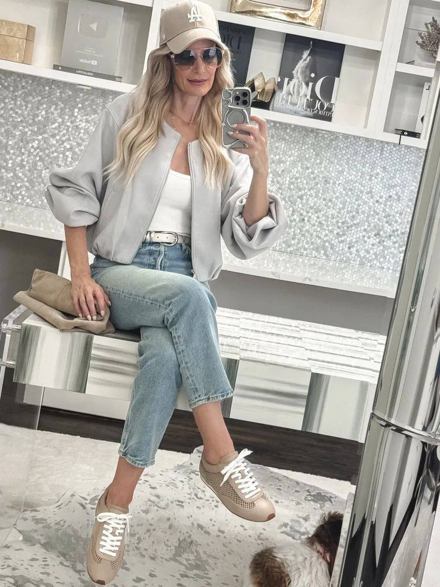 Obsessed with my new L-agence slim sneakers—the biggest sneaker trend of 2026! Neutral, breathable, insanely comfortable (walked my dog, zero blisters!), and perfect for summer. Wore them with my Express bomber (on sale!) and my favorite Agolde jeans—the perfect length for sneakers. I’m 5’4”, wearing XS jacket & size 24 jeans. These are going to be your new go-to too, I promise! ✨  

 

#LTKdayinmylife #LTKgrwm #LTKOver40