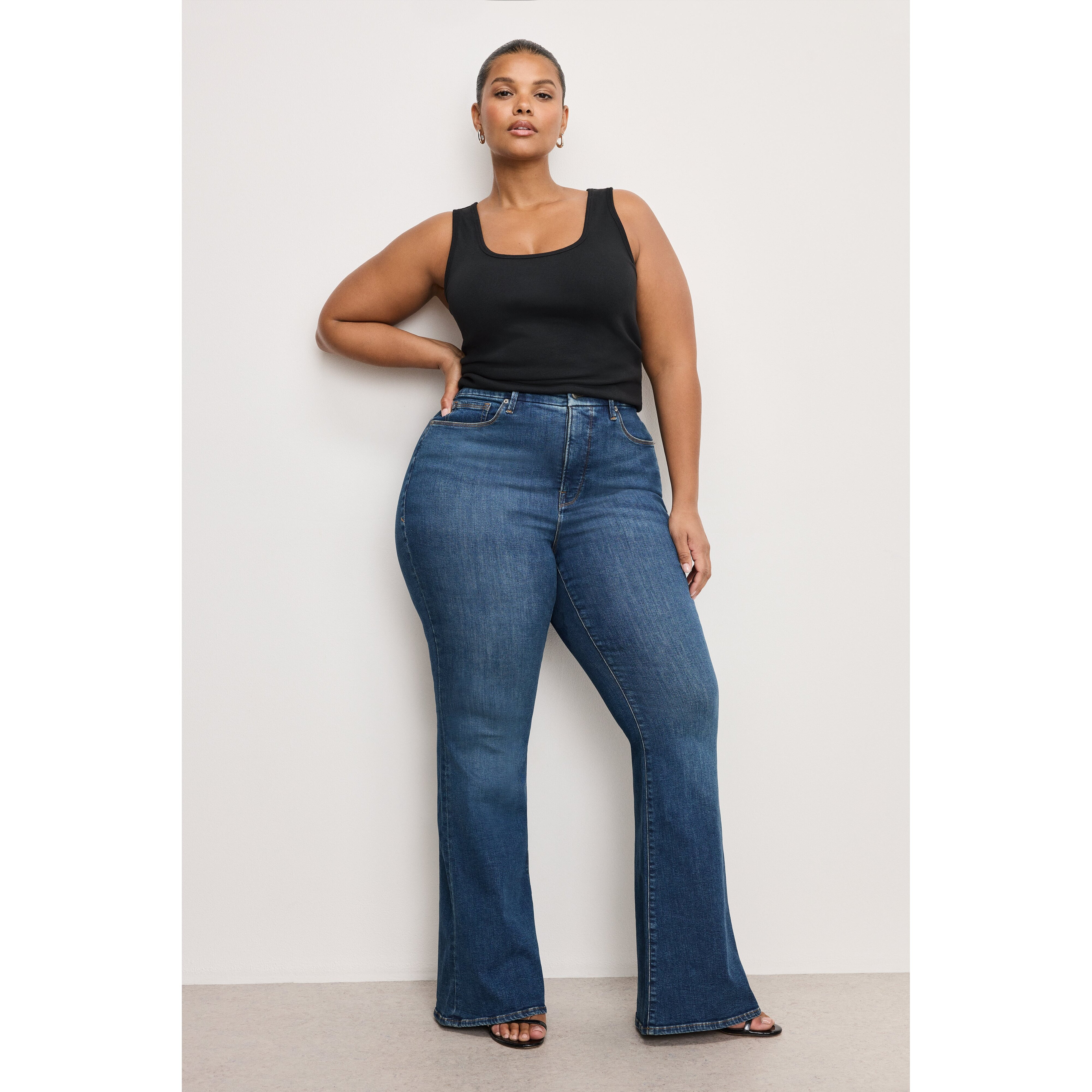 Women's Good Legs Flare Jeans | Extra Stretch, Flat Tummy Tech, Gap-Proof Waistband Long | Blue, Size 15 Plus | Good American by | Good American