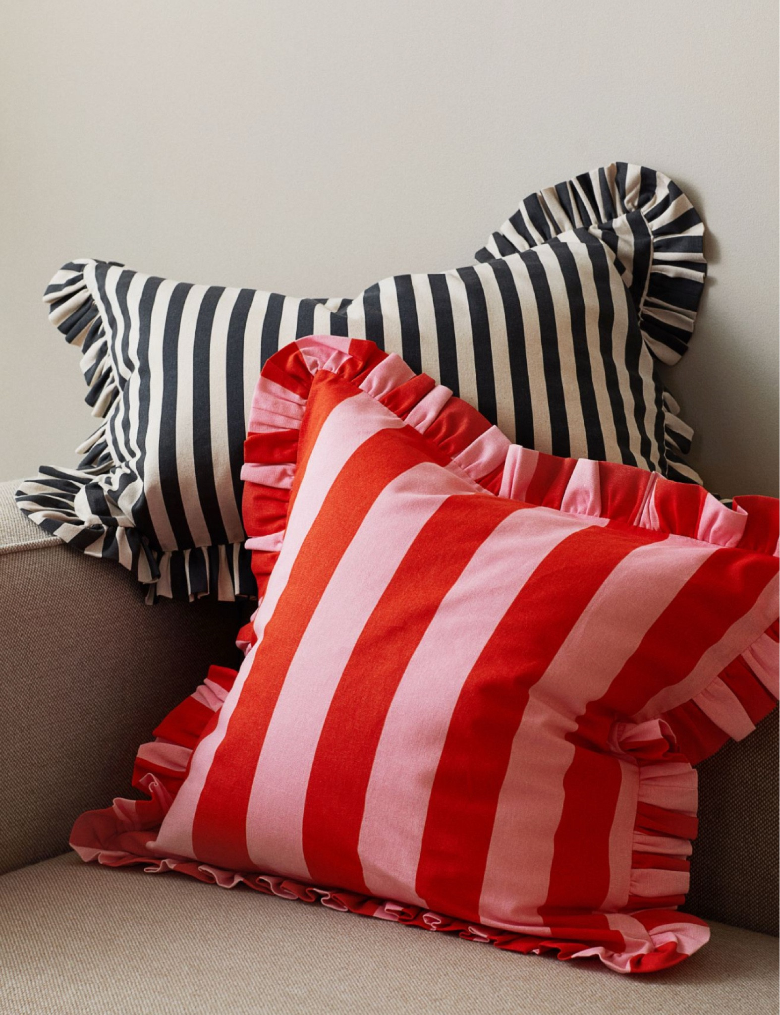 Obsessed with these stripe ruffle pillow covers! Super affordable and the colorways are amazing! 

#LTKGiftGuide #LTKFindsUnder100 #LTKHome