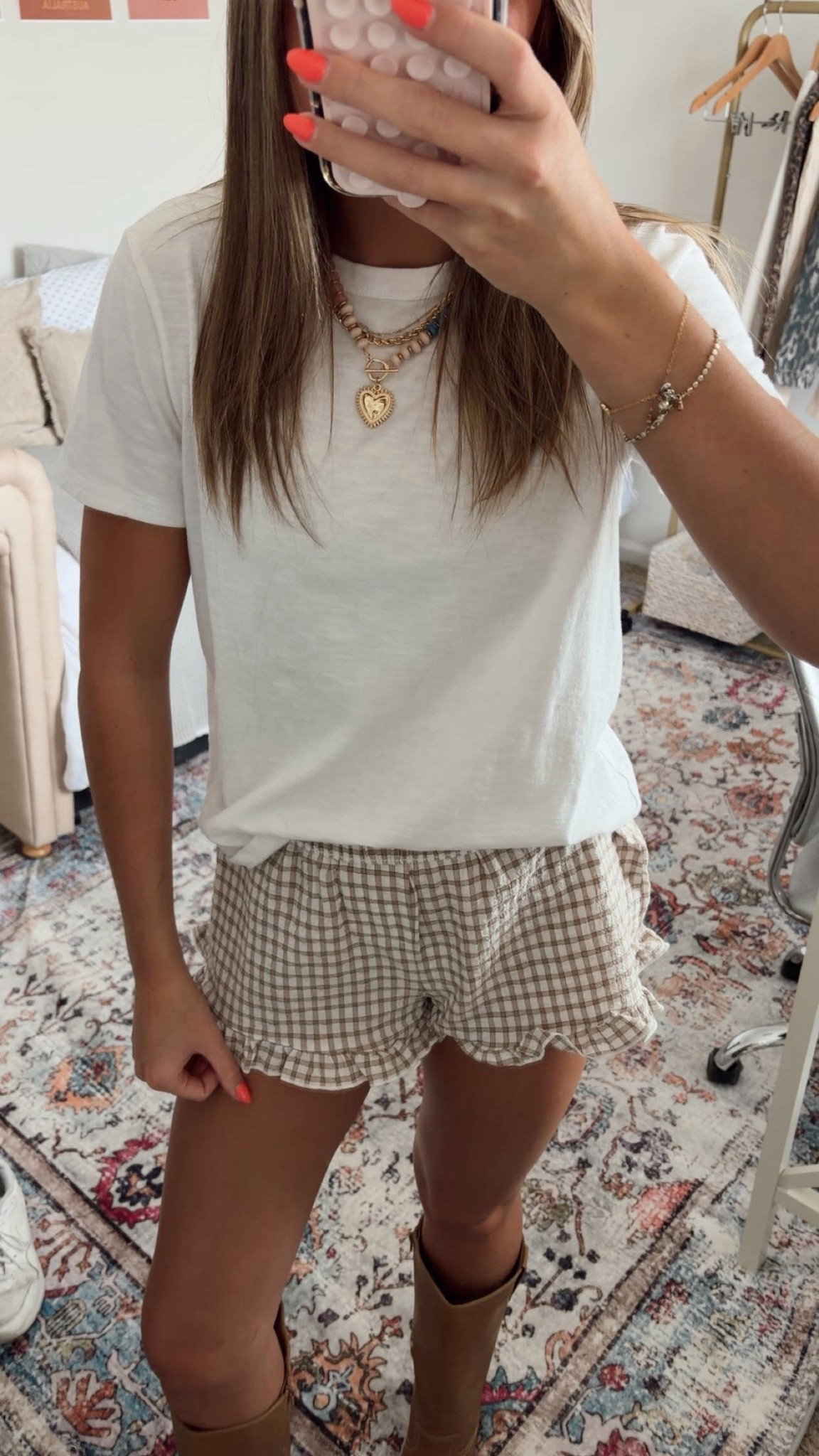 The cutest fall outfit with the best mix of cozy and playful details. I paired these brown gingham shorts with ruffled edges with a simple white T-shirt and brown boots for an easy everyday look. My colorful Amazon beaded necklace adds the perfect pop of color and makes the outfit feel a little more fun. Such an easy combination to recreate with pieces you probably already have in your closet.

#LTKFinds #LTKFall #FallOutfit #FallFashion #GinghamShorts #Gingham #BrownGingham #AmazonFinds #AmazonFashion #FallStyle #BrownBoots #CasualFallOutfit #AffordableFashion #FallWardrobe #OutfitInspo
 

 #LTKdayinmylife #LTKootd #LTKU