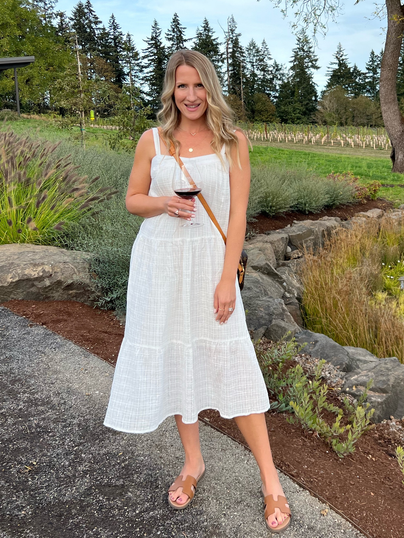 This is the perfect dress for spring and summertime flowy tiered white dress is a closet staple! #whitedress #springbreak #jennykayne

#LTKtravel #LTKfamily #LTKSeasonal
