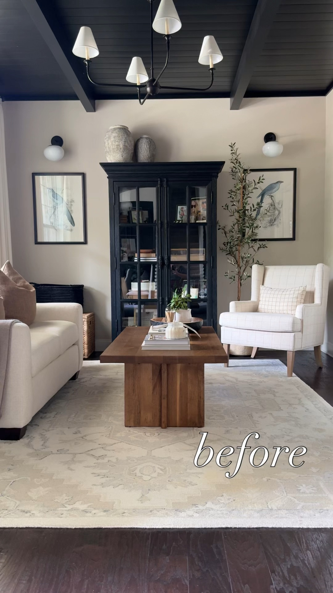 What a difference a rug makes! I just switched to this warm neutral in shades of brown, tan, beige and gray and it brightens up the black shiplap ceiling, Freire walls and dark wooden furniture pieces. home decor living room decor neutral area rug armchair bird print iron chandelier 

#LTKVideo 

#LTKHome #LTKStyleTip