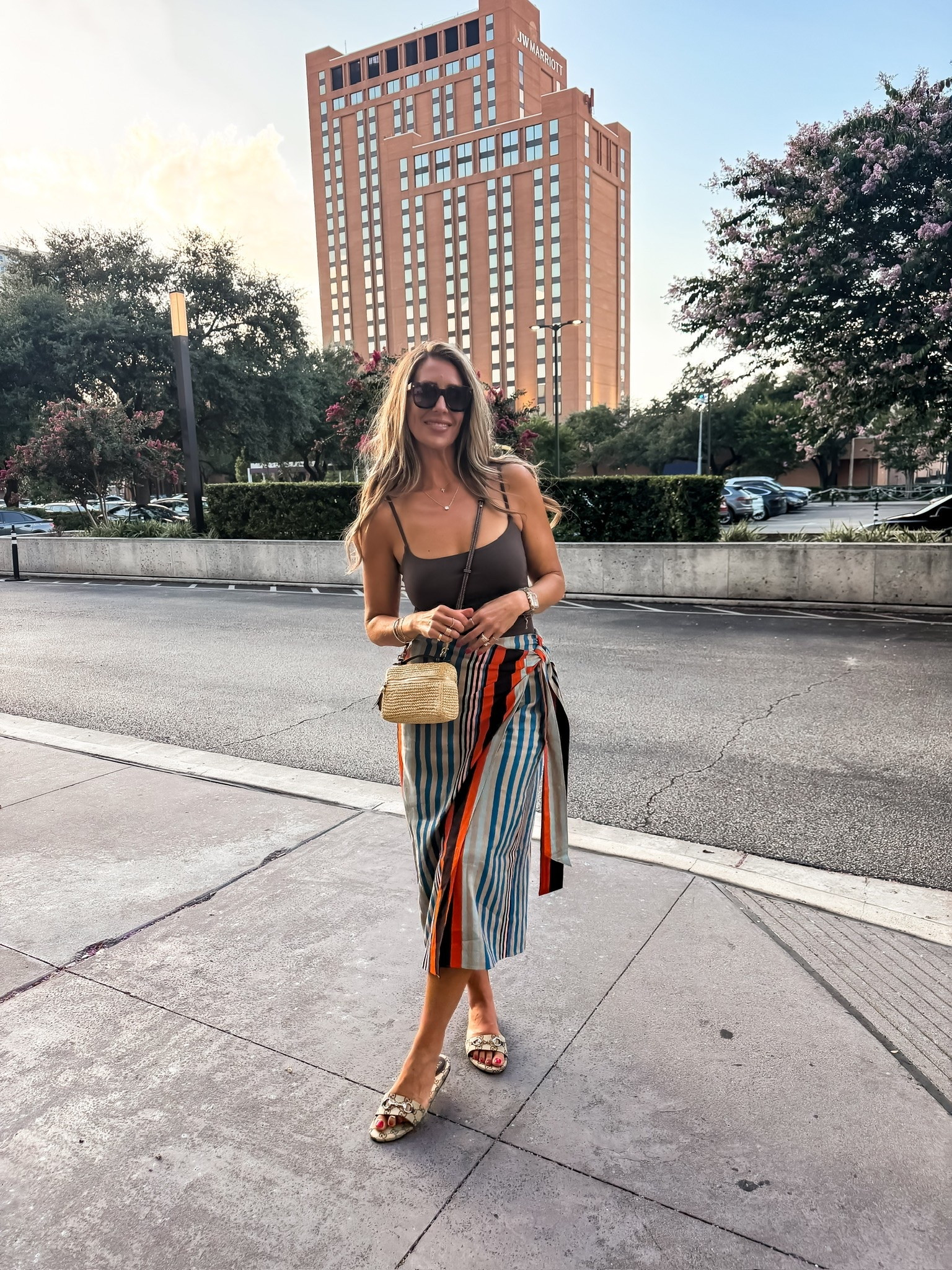 I love this striped wrap skirt for adding a little color and personality to a simple tank. It’s lightweight, flattering, and such a fun piece for vacation dinners, summer events, or date nights.

striped wrap skirt, summer skirt, vacation outfit, date night outfit, colorful summer style, neutral tank, raffia crossbody, resort wear, summer fashion, elevated casual outfit, vacation dinner look, themominstyle

#LTKootd #LTKSeasonal #LTKTravel