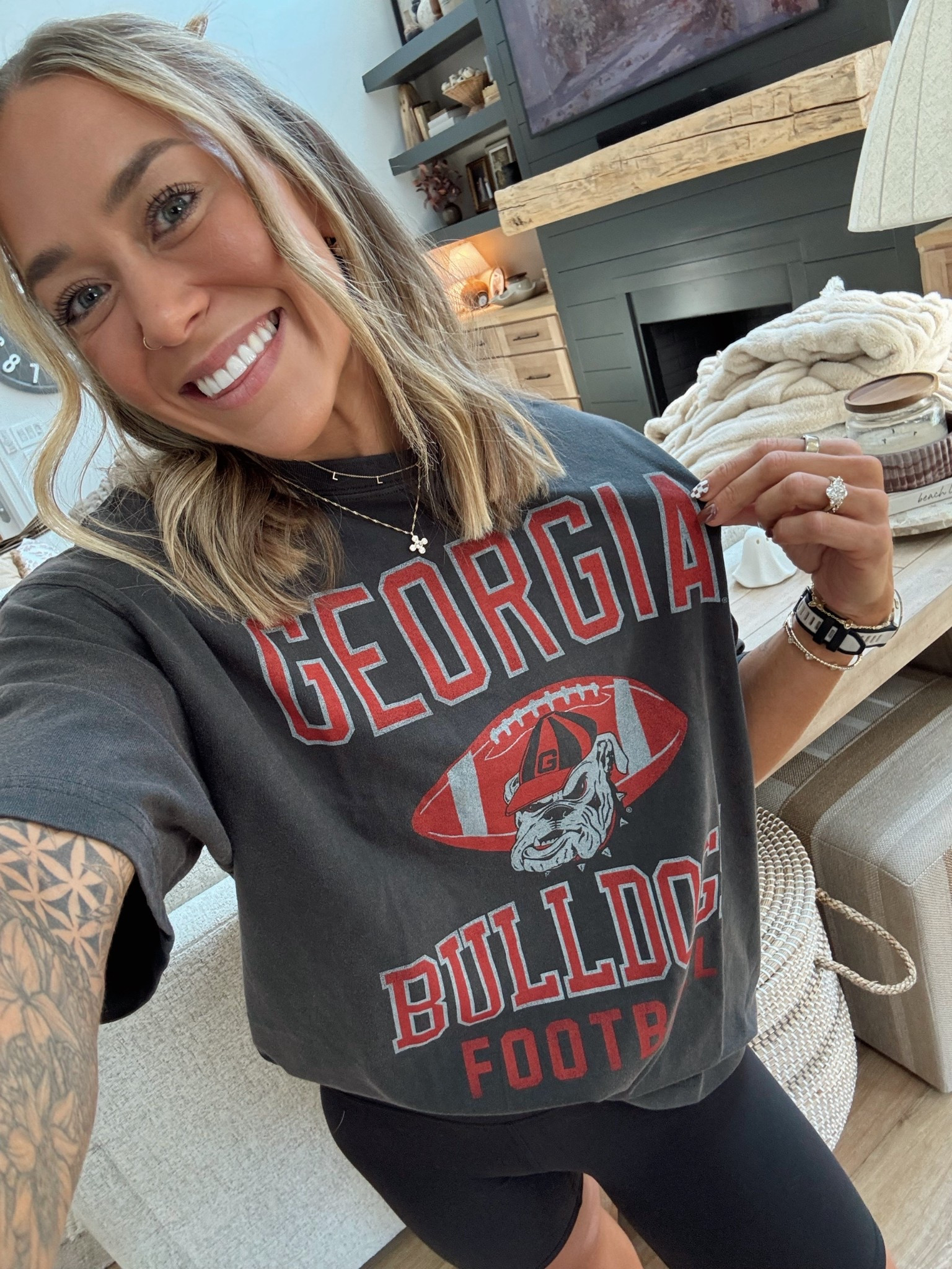 LOL @ the fact that I JUST REALIZED I bought this for JD 😂 HAHAHAH oh well. Georgia fan for my hubby but a Hawkeye at heart OK🙈🖤wearing a L! Linked a TON of cute game day options from my fave teams! 👇🏼🏈

Georgia bulldogs football / American Eagle / comfy fit / buckle / Iowa Hawkeyes / Holley Gabrielle 

#LTKStyleTip #LTKSeasonal #LTKFallSale