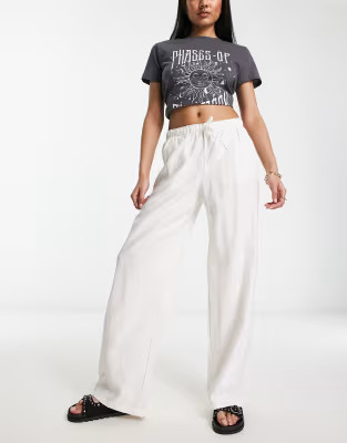 Bershka tie waist wide leg linen pants in white | ASOS (Global)