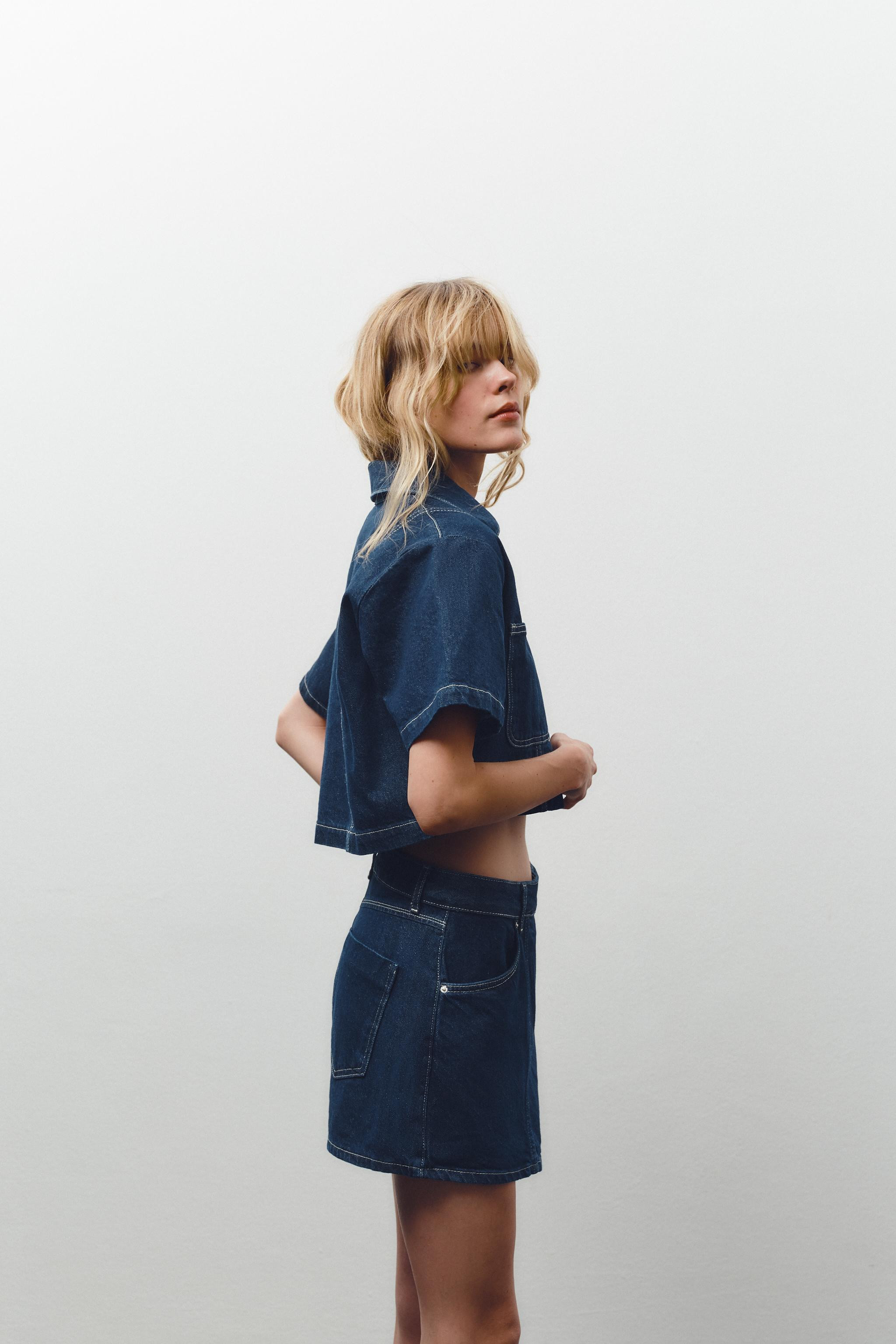 Collared, short sleeve shirt with a V-neck. Featuring front patch pockets and a metal button fast... | Zara UK