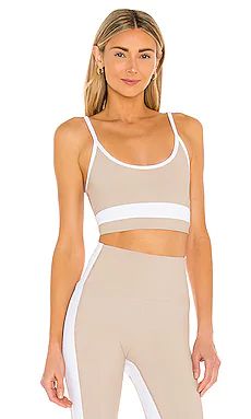 BEACH RIOT Eva Sports Bra in Taupe & White from Revolve.com | Revolve Clothing (Global)