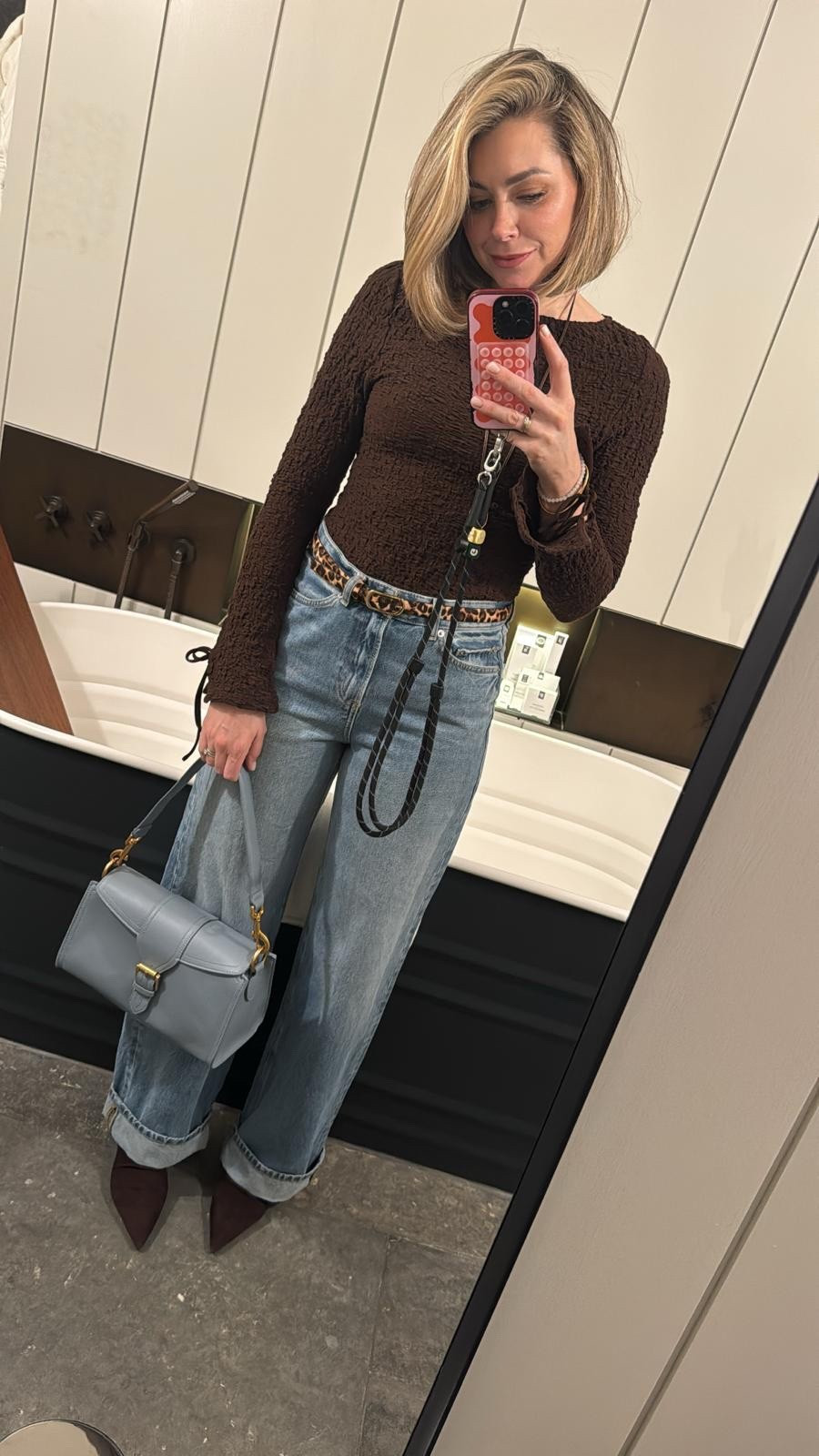 An easy, wearable outfit that still feels styled ✨
M&S wide turn-up jeans, brown ruched top, leopard print belt and brown suede boots — proof that neutrals don’t have to be boring.
Linked over on LTK 🤎

#LTKstyletip #LTKuk #LTKjeans