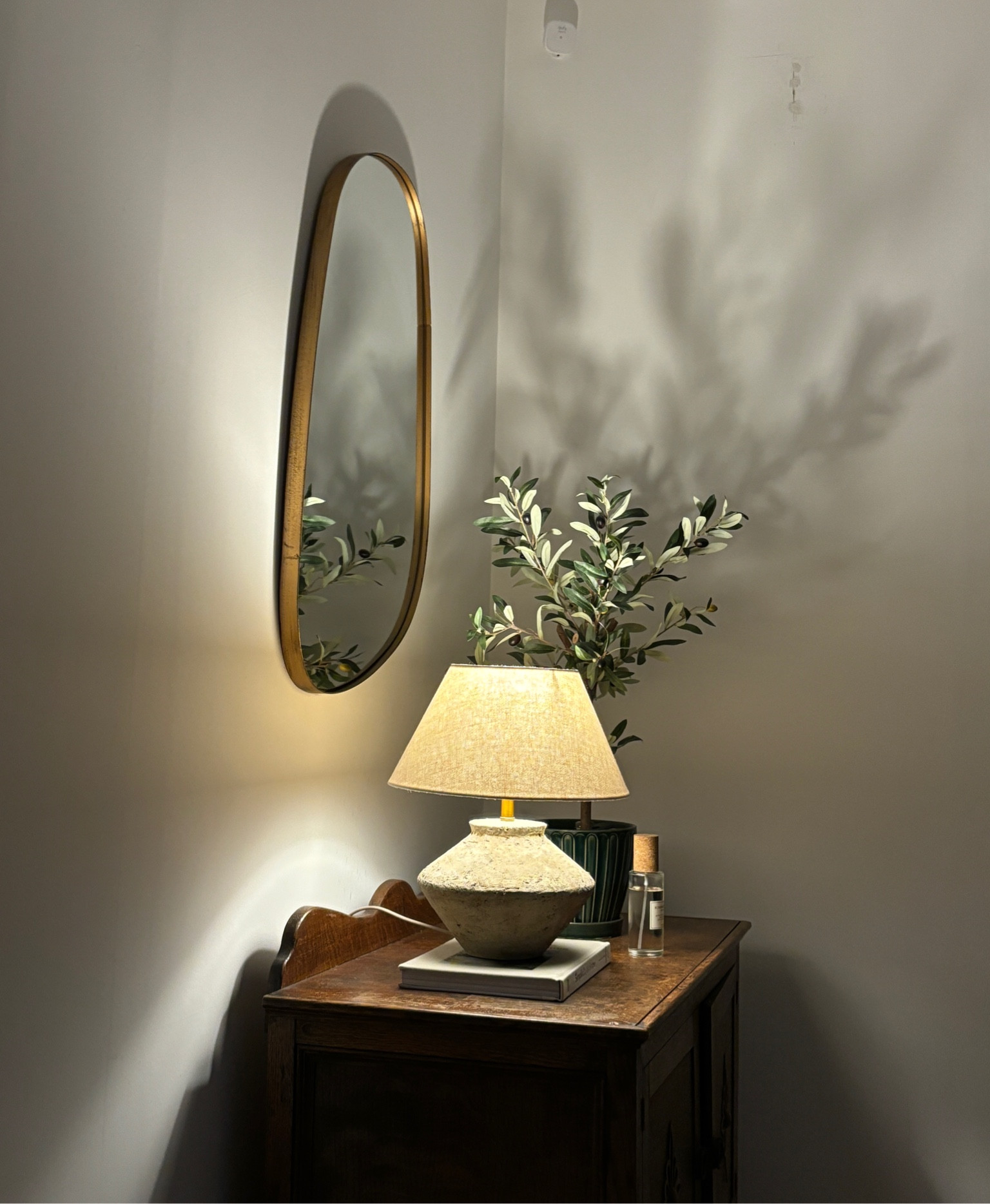 Console table, stoneware lamp, olive tree, faux olive tree, gold mirror table lamp, room spray, h&m home, dunelm, b&q 

#LTKhome #LTKfindsunder100 #LTKeurope